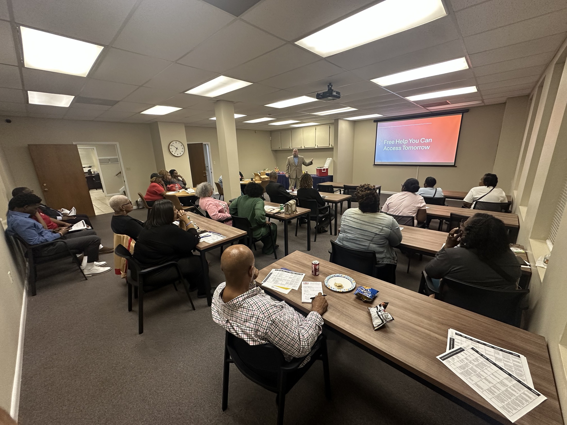 Community members gathered for a presentation about practical local support.